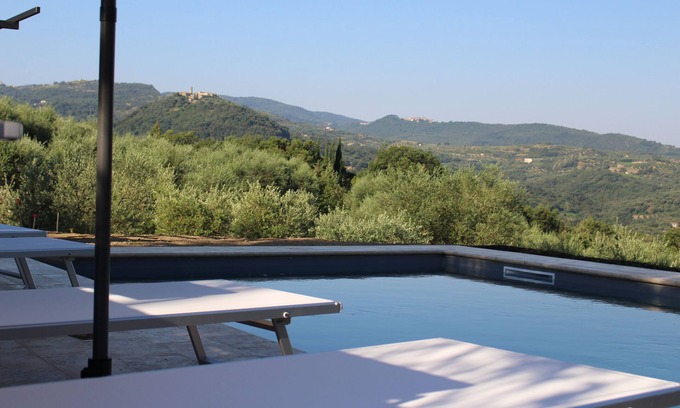 Seggiano House | Beautiful natural stone house with pool in the middle of an olive grove