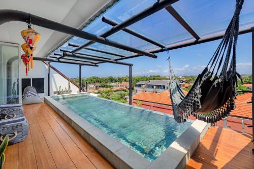Batubelig Villa | Beautiful Penthouse w/incredible views, pool, & cinema room!