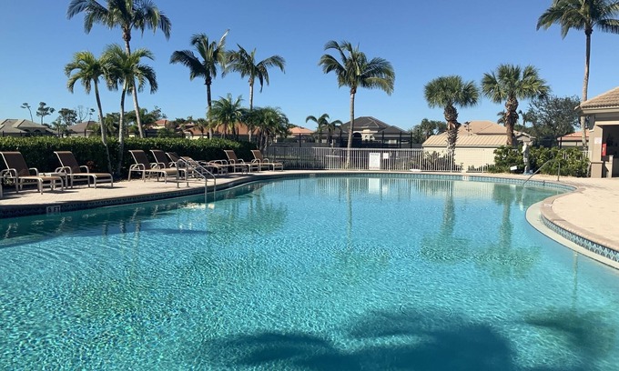 Catalina Isles House | Beautiful sunset and water view home in Crown Colony gated community.