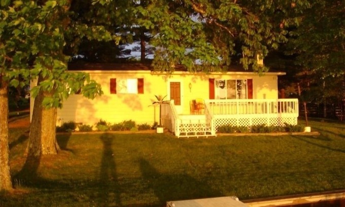 Kalkaska House | Beautiful Sunsets Over the all sport's, quiet Crawford Lake. Year round rental!