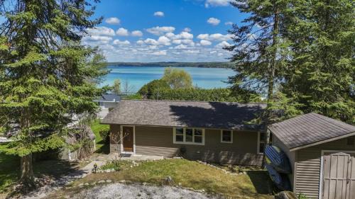 Rapid City House | Beautiful Torch Lake House with Beach Access home