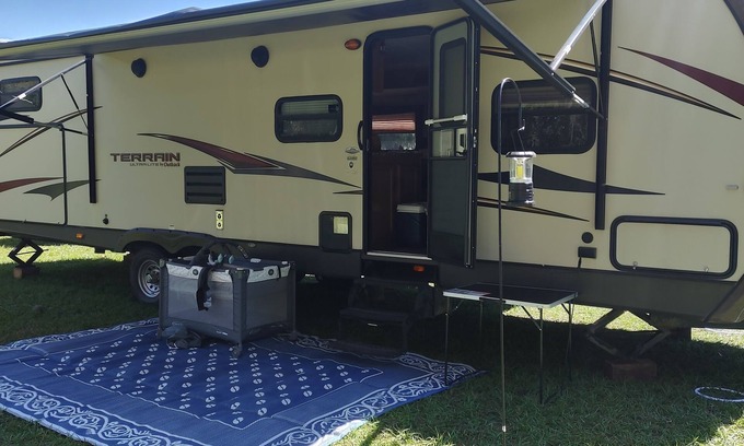 Dade City House | Beautiful travel trailer with private fenced in yard, deck, and fire pit.