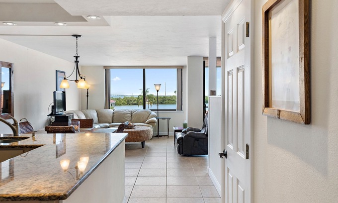 Isla del Sol Condo | Beautiful updated 3rd floor condo with open floor plan and lovely water views