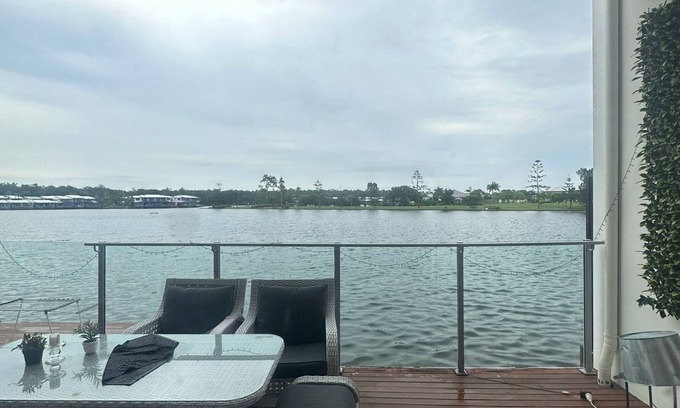 Coombabah House | Beautiful water front property with full kayak paddle board access, pvt pool