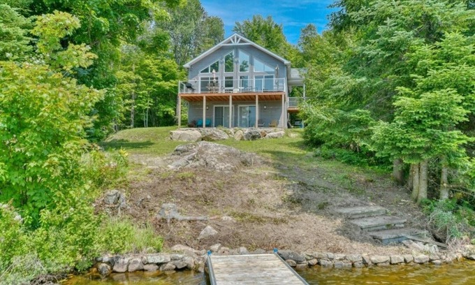 Mille-Isles Ski Chalet | Beautiful waterfront cottage on a pristine lake in Morin Heights