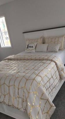 Southwest Edmonton House | Bedroom with private bathroom in Southwest