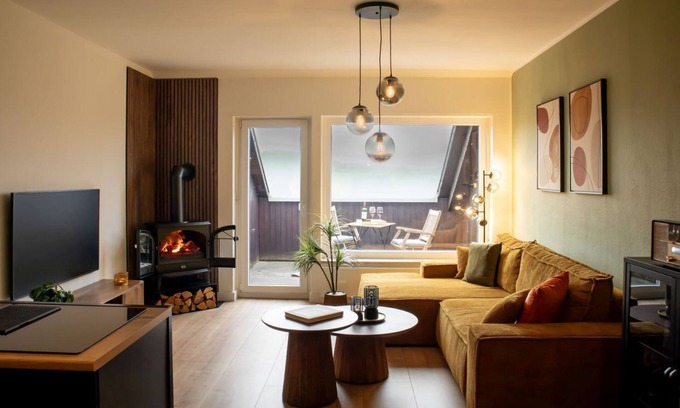 Niedersfeld Apartment | BERGPANORAMA - BERGPANORAMA apartment in Winterberg-Niedersfeld with balcony, fireplace and parking space