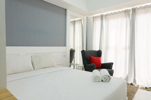 Serpong Apartment | Best Price Studio at Casa De Parco Apartment By Travelio