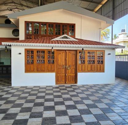 Kannur Hotel | Bharatham Heritage Inn
