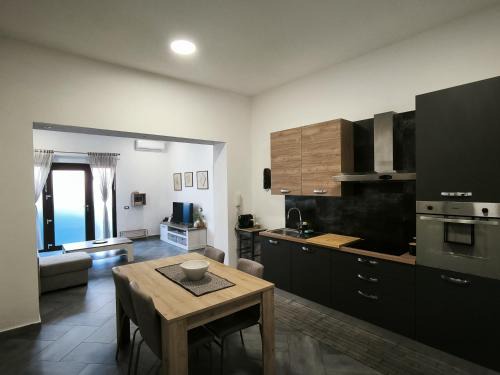 Capoterra Apartment | Bidda Mores Appartamenti- Il Cacciatore