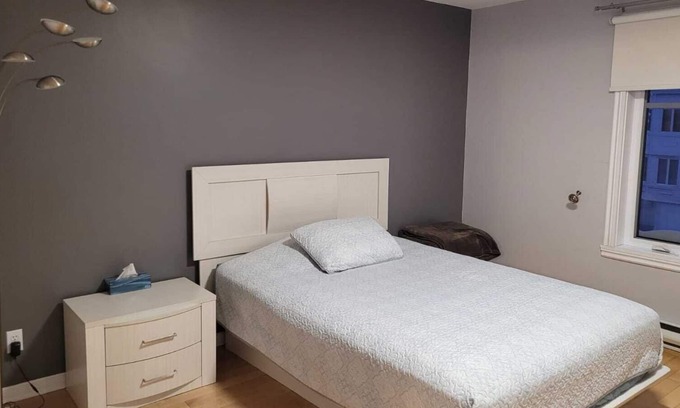 Laval House | Big house with garage, patio and backyard