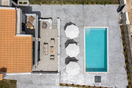 Afytos Villa | Black Lotus Pool Villa, Afitos #FeelsLikeHome