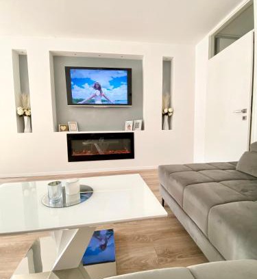 Siska District Apartment | Black & White Hideaway with garage