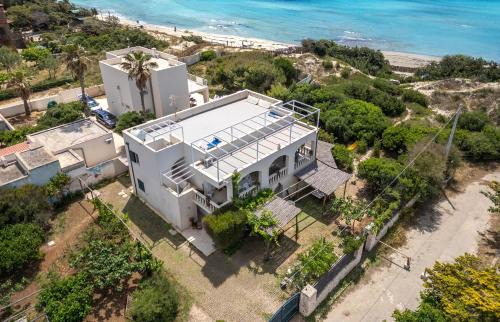 Punta Prosciutto Apartment | Bliss Attico Fronte Mare by BarbarHouse