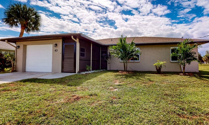Pebble Beach House | Blue sky retreat near the water with updated living quarters, beach gear, and AC