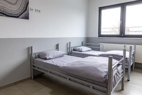 Hanau Apartment | BOARDINGHOUSE KAYSER Günstige Monteursunterkunft, Monteurwohnung in Hanau bei Frankfurt am Main und Aschaffenburg, KOSTENFREIE PARKPLÄTZE!