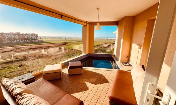 Cherrat Apartment | Bouznika Escape: Vue Océan, Bassin Privé, Plage, Surf, Piscine, Randonnée & Vélo
