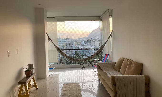 Zona Sul Apartment | Apartment in Jardim Botânico - safe neighborhood and view of the lake with sunset