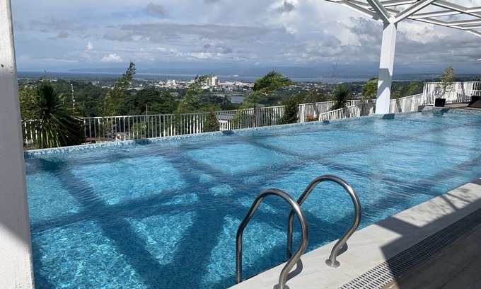 Cagayan de Oro House | Brand New Condo with pool and gym. One minute walk from Mall