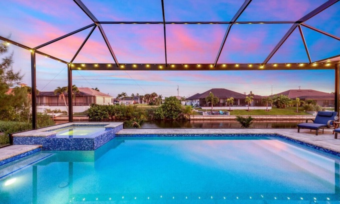 Pelican House | BRAND NEW- Gulf access electric heated pool home sleeps up to 13 guests