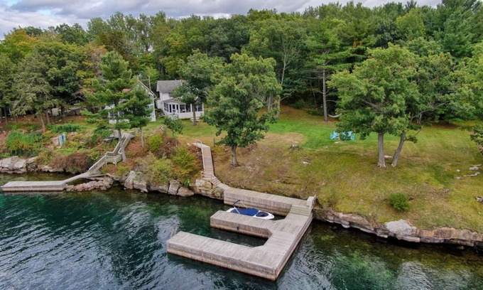 Frontenac Cottage | Breathtaking River Views from Quaint Historic Round Island Cottage