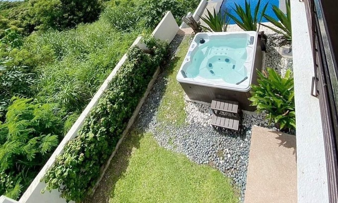 Poblacion Villa | Breathtaking sea and hill view. 5 mins drive to beach. Pet Friendly.