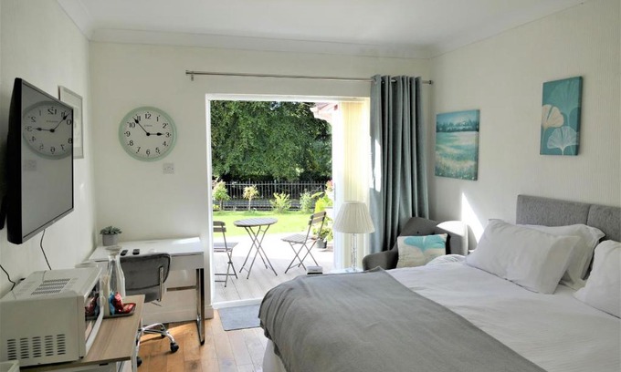 Stafford House | Bright double room with canal view and private patio, entrance and parking