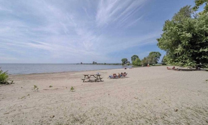 Lagoon City Cottage | Bright Modern Waterfront Cottage w/hot tub - 5 min from the beach!