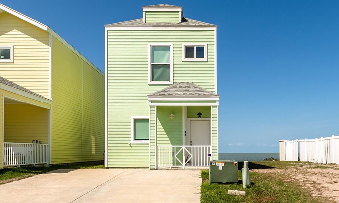Port Isabel House | Bright Waterfront Home with Shared Pool, Water View, and High-Speed WiFi