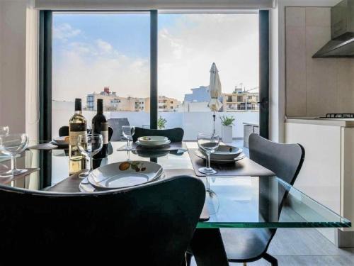 Bugibba Apartment | Bugibba Deluxe Penthouse with terrace & communal swimming pool