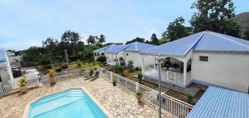 Capesterre-Belle-Eau House | Bungalow charmant à Capesterre-Belle-Eau avec piscine partagée