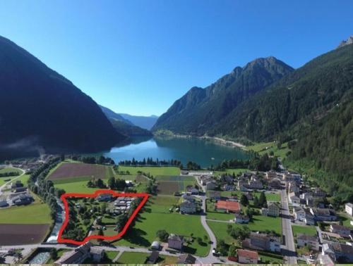 Le Prese House | Bungalow Li Presi in Camping Cavresc, Via dal Cavresc 1, 7746 Le Prese-Poschiavo