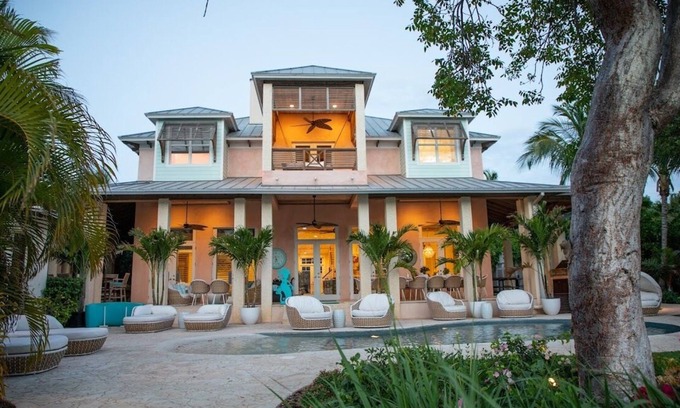 Dunmore Town House | Buttonwood – Bayfront Luxury Villa with Private Dock + Pink Sands Beach Access