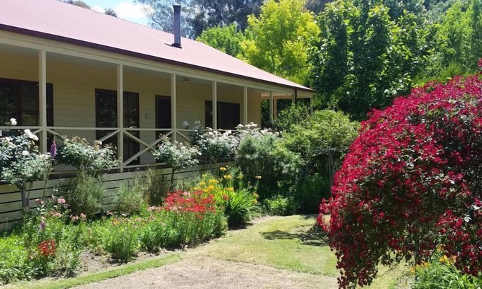 Buxton House | Buxton Gardens by the RivernCountry style home, river flowing thru the backyard