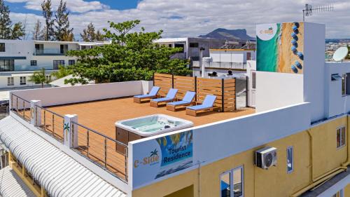 Flic-en-Flac Apartment | C-side Studios - newly fully renovated beachfront residence with rooftop jacuzzi