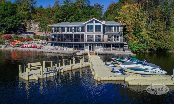 Bobcaygeon Cottage | Expansive luxury cottage on Pigeon Lake! 2 Bunkies, Watertoys and Firepits!