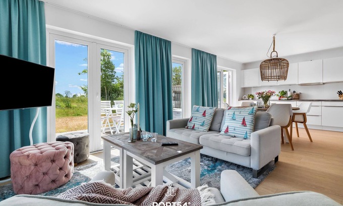 Olpenitz Apartment | Cabin 34 - sauna, fireplace, shower, washing machine, terrace, beach chair