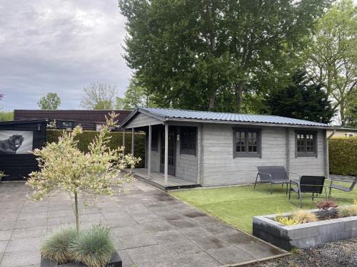 Tzummarum House | Cabin in Tzummarum with Pool and Tennis Court