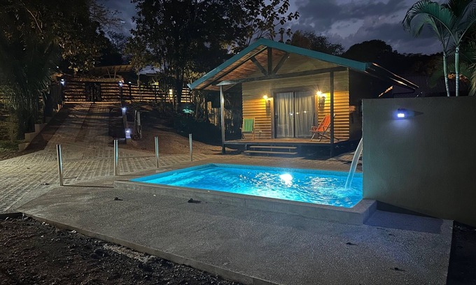 Puerto Carrillo House | Cabin style home located in residential area a mile from beach.