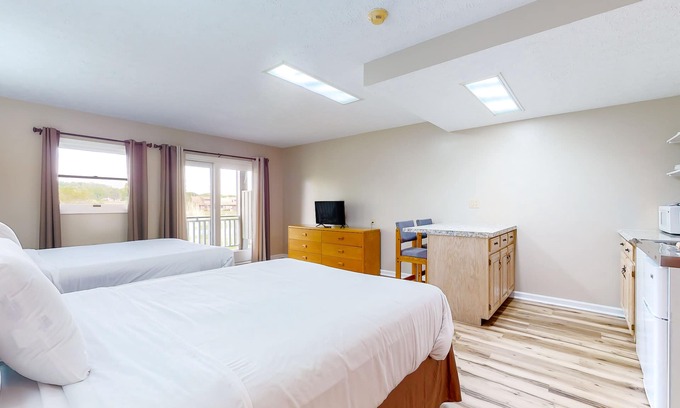 Baneberry Apartment | Calm, dog-friendly studio with patio, gym, game room & picnic area - near lake