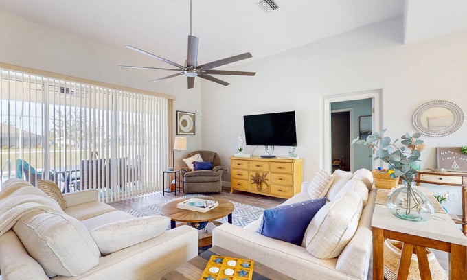 Pinehurst House | Canal-front home with private heated pool, patio, canal views & bikes