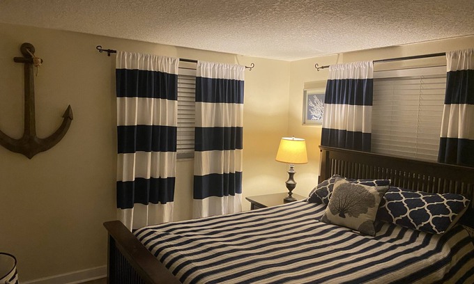 Hudson Beach Estates House | Canal front home walking distance to restaurants and small beach