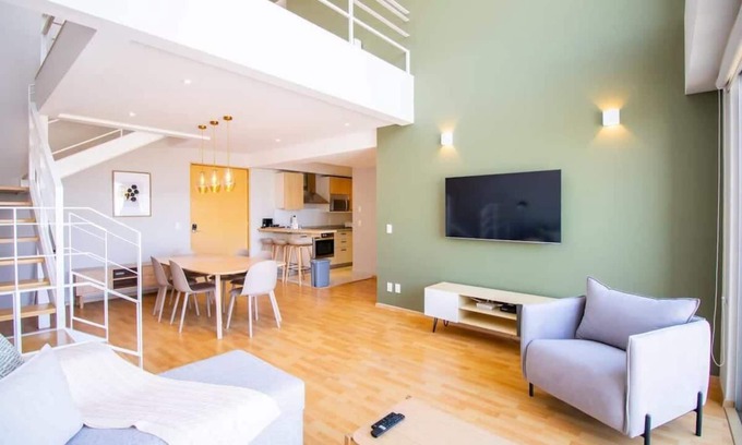 El Yaqui Condo | Capitalia - Duplex, Sleek & Modern
