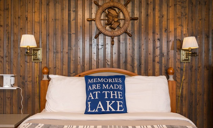 North Lake House | Captain’s Den is our executive blue toned all wooden room with a Captain’s flair