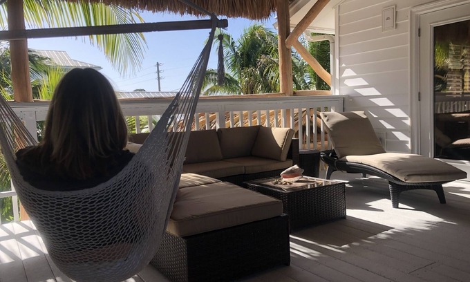 Englewood Apartment | Caribbean Tiki Hut relaxation. Enjoy the Islands & Boca Grande without the costs