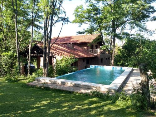 Ascochinga House | Casa completa con piscina y quincho en Ascochinga, 4 habitaciones, zona golf