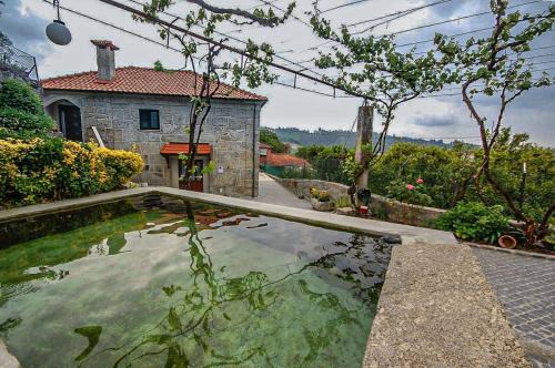 Povoa de Lanhoso House | Casa da Ramada - Water SPA Tank with running natural spring water - by Bedzy