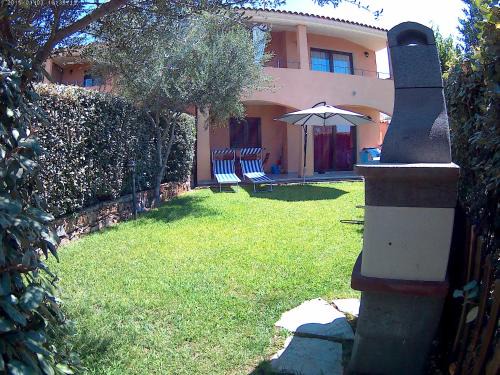 Pittulongu House | CASA DEL FARO Piano Terra con Giardino