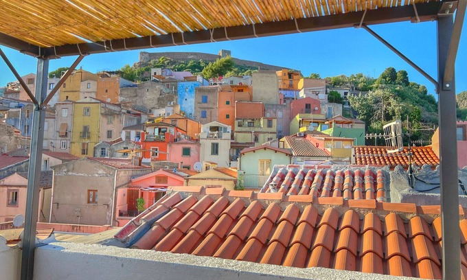 Bosa Historic Centre Apartment | Casa Episcopio with Exclusive Terrace: View of the Village, River and Sea