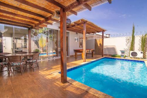 Setor Lagoa Quente House | Casa Ipê - Luxo em Cond Fechado c/Piscina Aquecida
